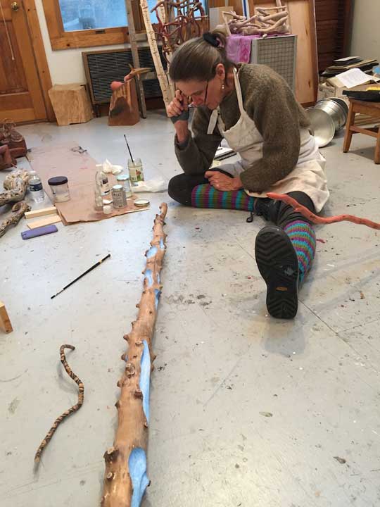 Susan Lyman working in her studio